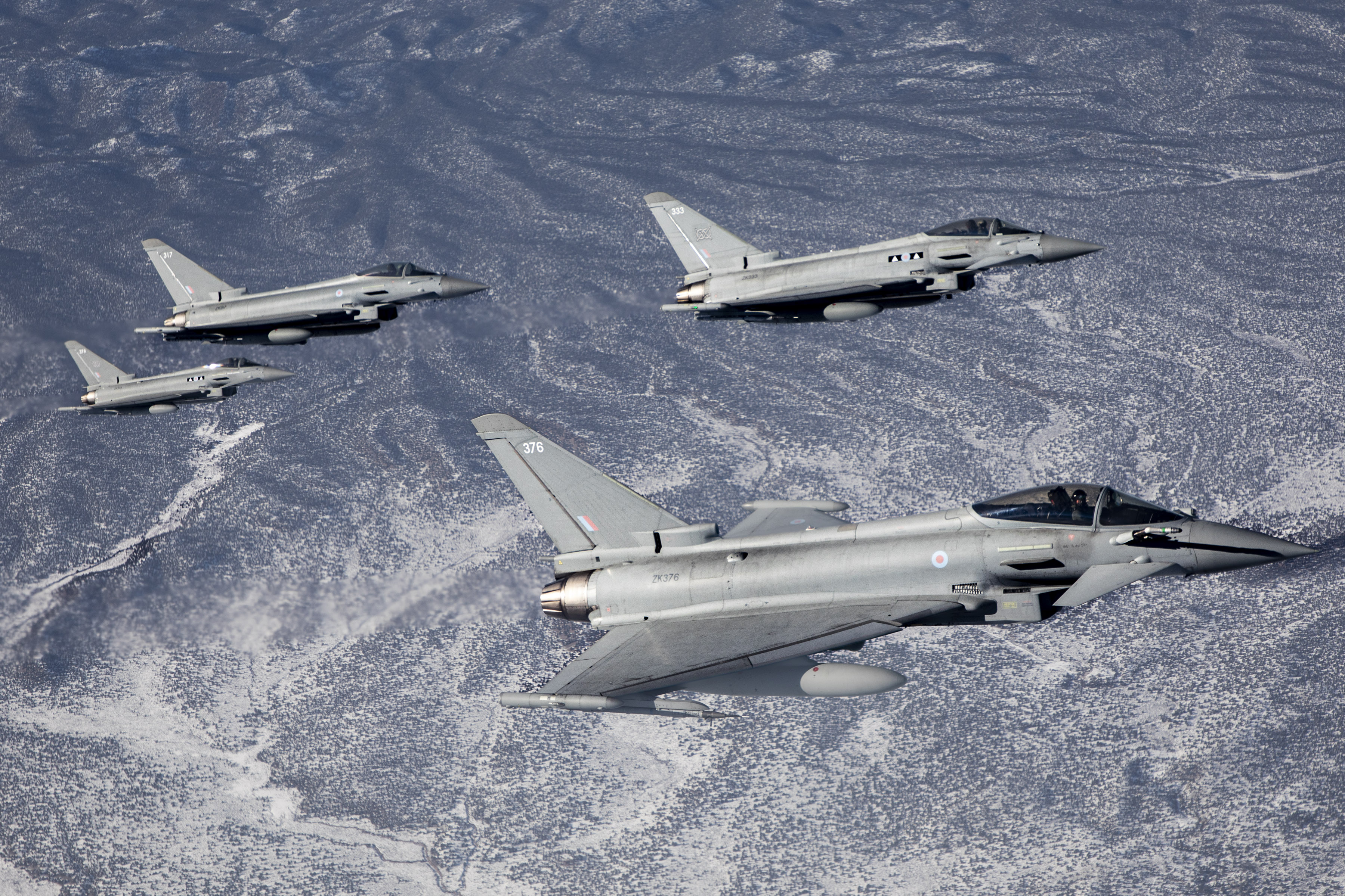 Image shows RAF Typhoon aircraft flying in formation.